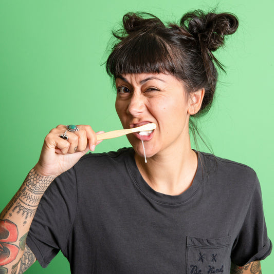 Photo of Marissa brushing with Canary Toothpaste Tablets
