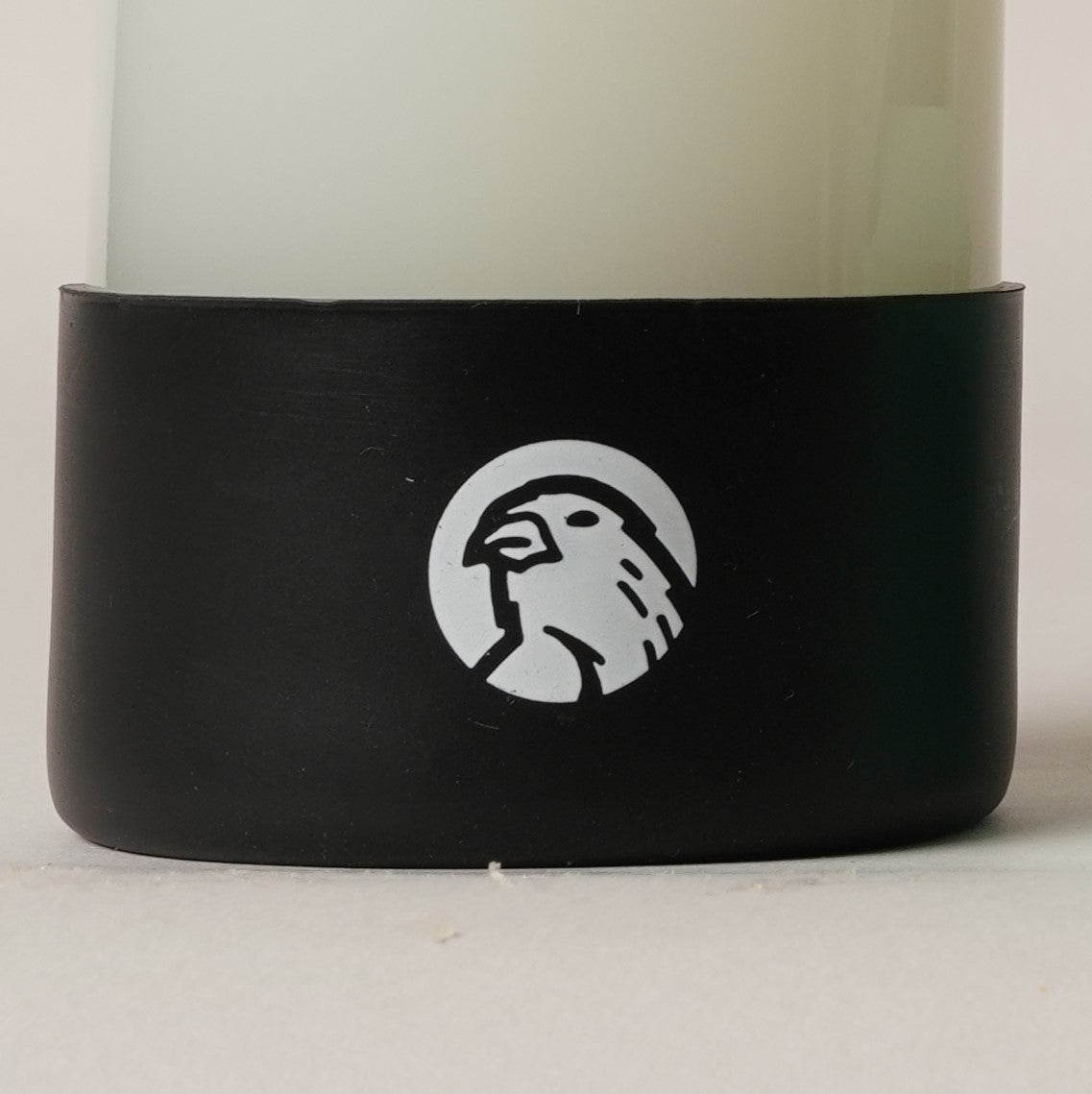 Image of Silicone base sleeve for sustainable refillable glass bottle.