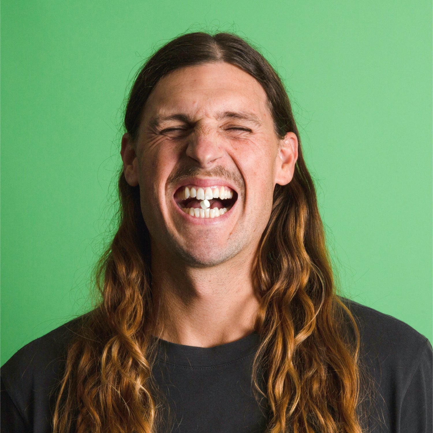 Kevin with a Canary toothpaste tablet in his mouth