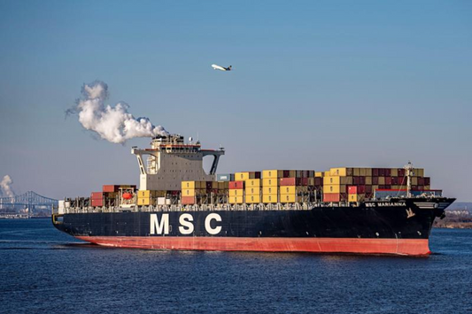 Shipping container boat putting out gasses into air