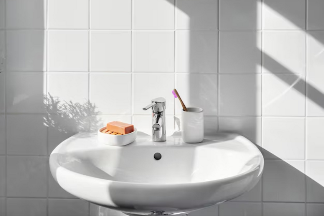 Plastic free bathroom with bamboo toothbrush and bar soap. Add in our toothpaste tablets for plastic free oral care.