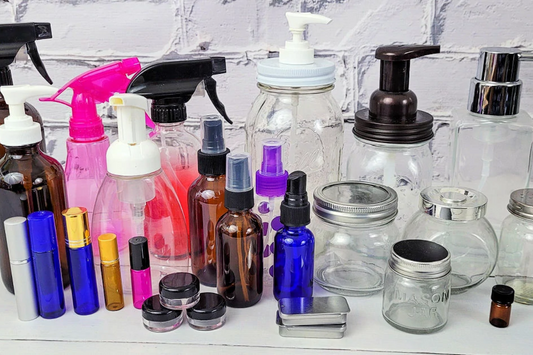 Plastic and Glass bottles on counter top showing how plastic is not sustainable