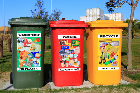 Bins separated by compost, waste, and recycle