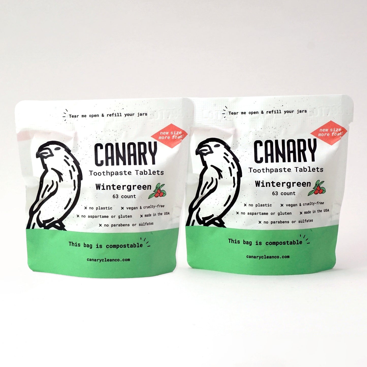 New and Improved Canary Wintergreen Toothpaste Tablets, 2-pack of the sample size 63 count compostable pouches, front view of the pouches
