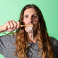 Kevin brushing with Canary Peppermint Toothpaste Tablets, with foam dripping down his chin