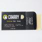 Canary Citrus Bar Soap partially out of the plastic-free packaging