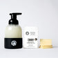 Image of Unscented Foaming Hand Soap. Sustainable refillable glass bottle filled with soap and 6 soap slices next to product.