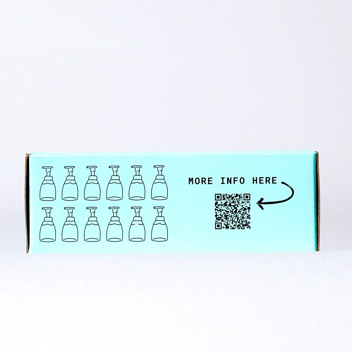 Fir Needle & Sage Concentrated Foaming Hand Soap. Side of the box showing 12 bottles and QR code. 12-count box. 