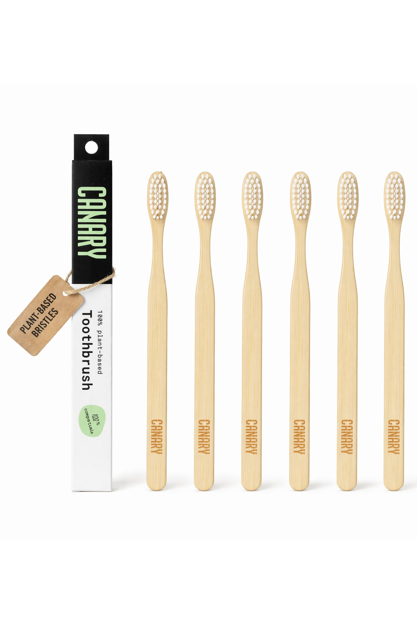 6 Canary Plant Based Bamboo Toothbrush with packaging next to product.