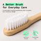 Canary Plant based bamboo toothbrush showcasing soft bristles and bamboo grip.