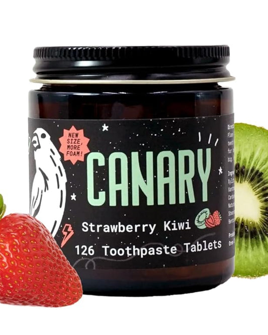 Close Up Image of Canary Strawberry Kiwi Toothpaste tablets jar - 126 count. With a strawberry and a kiwi slice next to jar.