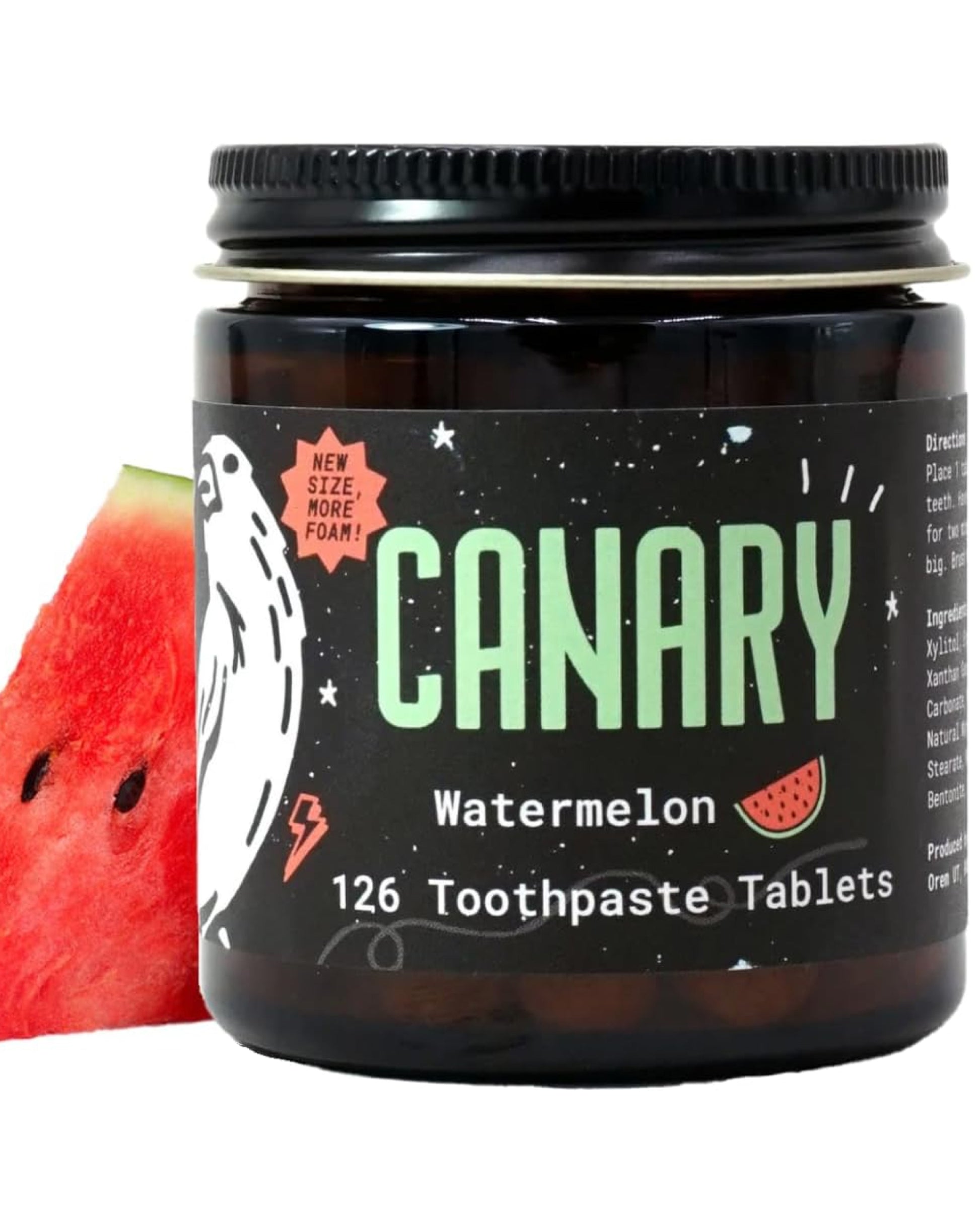 Close Up Image of Canary Watermelon Toothpaste tablets jar - 126 count. With a slice of watermelon in the background.
