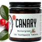 Close Up Image of Canary Wintergreen Toothpaste tablets jar - 126 count. With wintergreen leaves in the background