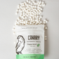 240 ct pouch of the peppermint toothpaste tablets, spilling out of the pouch. 