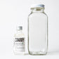 Peppermint Mouthwash Concentrate and Empty Mixing jar. 