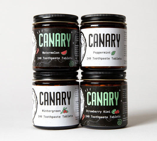 Canary Toothpaste Tablets Stack 4 jars. Watermelon, Peppermint, Wintergreen, and Strawberry Kiwi Flavored. 